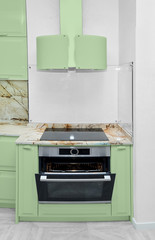 oven with extractor fan in the kitchen. Minimalism