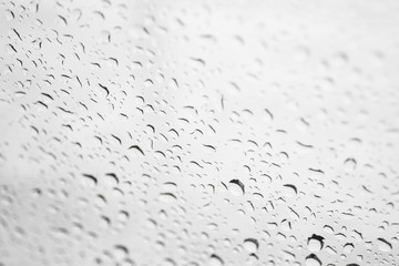 Rain drop on glass background.