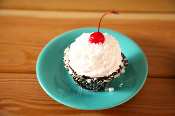 Strawberry dessert on the plate a wooden table