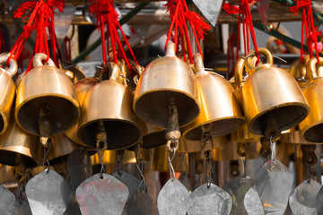 Traditional Buddhist wind bells hanging near Golden Rock. Most sacred Buddhist place in Myanmar (Burma)