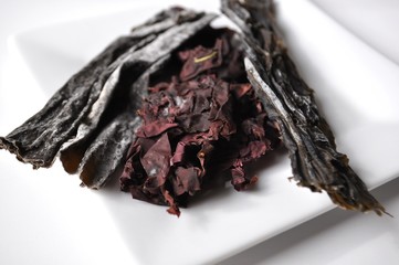 Dulse, wakame and kelp seaweed close-up on white © akvals