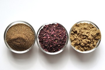 Kelp, Dulse and Wakame seaweed in bowls on white with copy space