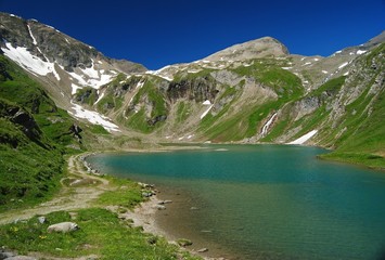 Naklejka na ściany i meble High Alpine lake near Grossglockner in Austria.