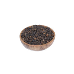 Black pepper in wooden bowl isolated on white background