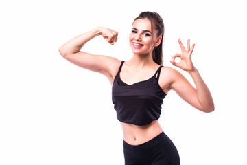 Fitness sporty woman showing her well trained body.