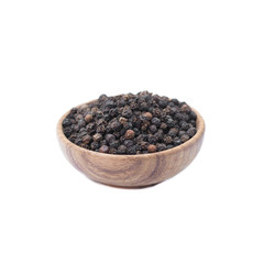 Black pepper in wooden bowl isolated on white background