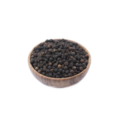 Black pepper in wooden bowl isolated on white background
