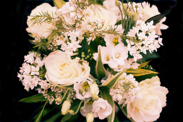 Bouquet of Fresh White Flowers Against Black
