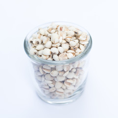 Millet rice , millet grains in bowl on white