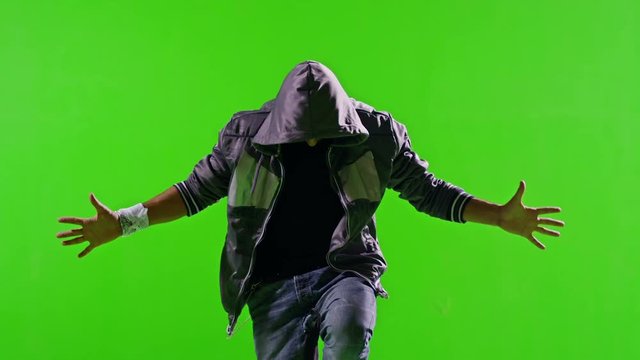 Professional Hip Hop break dance. In mask. Dancing on Green screen. Few shots. Slow motion.