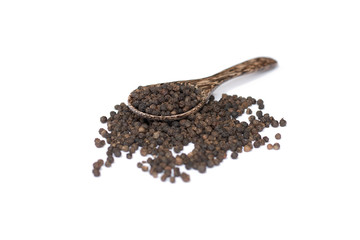 Black pepper in spoon wooden bowl isolated on white background
