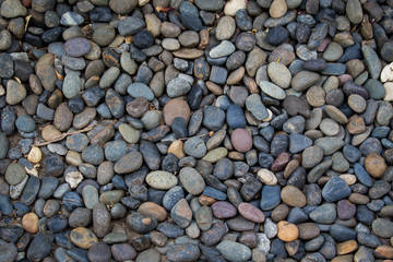 Blue dark stones background.