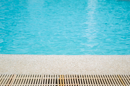 Swimming pool edge close up background.