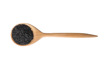 black sesame on wooden spoon isolated on white