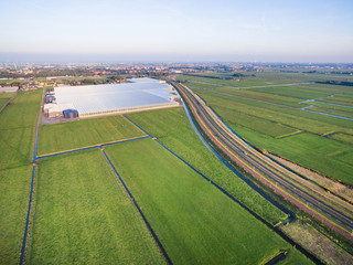 Obraz premium Aerial view of greenhouse in fields Netherlands