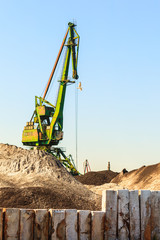 Obraz premium Crane working in harbour.