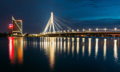 Obraz premium Riga Latvia. Scenic View Of Vansu Cable-Stayed Bridge In Evening