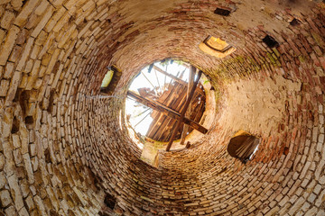 Inside Bottom View Of Destroyed Abandoned Brick Through Tower In Evacuated Zone