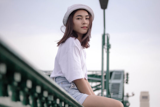 thai adult girl white T-shirt beautiful girl relax and smile