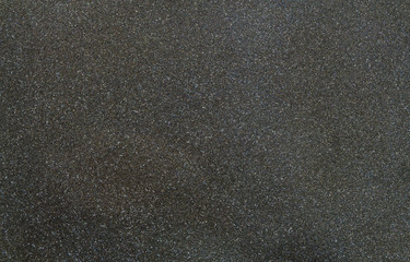 Texture of black sponge wave with glitter from speaker