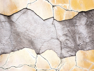 photographed close-up of a crack in the plaster walls of the old - obrazy, fototapety, plakaty