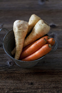 Carrots and parsnips in a bucket