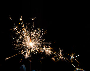 Sparkler on a birthday cake fizzling