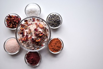 Luxurious SPA Bath salts and ingredients, top view, on white background