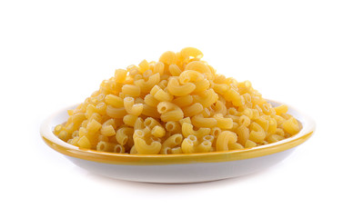 dry macaroni in the white bowl on white background