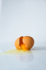 Broken Egg on White Background