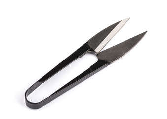 Scissors for sewing on a white background