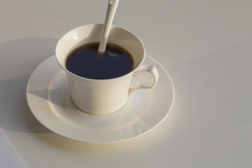 Business concept , blank paper and cup of fresh coffee on the table in office 