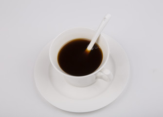 Black coffee cup on the white background  top view