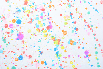 colorful splashes on a white background