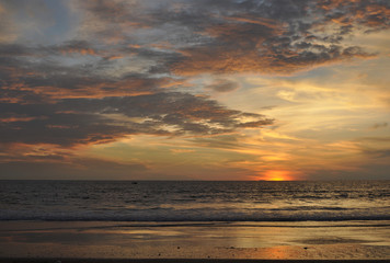 Naklejka na ściany i meble Sunset on the beach of Goa.India 