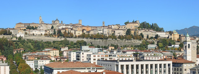 Naklejka premium Bergamo - Old city (Citta Alta). One of the beautiful city in Italy. Lombardia. Landscape on the old city during a wonderful blu day. 