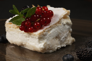 Krempita with berries closeup