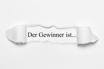 Der Gewinner ist...auf weißen gerissenen Papier