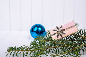 Christmas decoration on a white striped background - selective focus, copy space