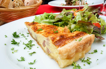 one slice of Salty pie Quiche ready to eat