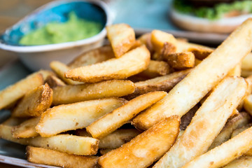 Golden French fries potatoes ready to be eaten