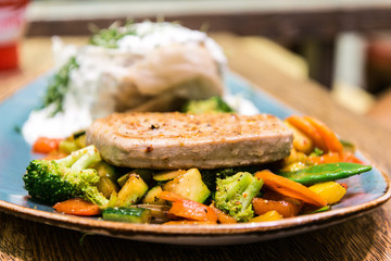 juicy steak veal - beef meat with tomato and potatoes