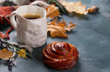 Hot coffee in mug with plaid