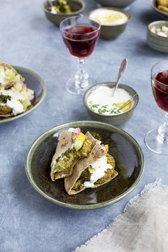 Charred Broccoli Falafel with Charred Lemon Tahini and Tzatziki