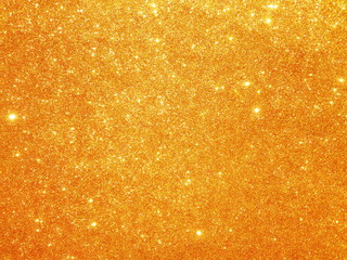Christmas gold background. Golden holiday glowing glitter