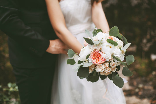 Bride holding her wedding bouquet