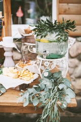 Details of a rustic wedding candy and cheese bar