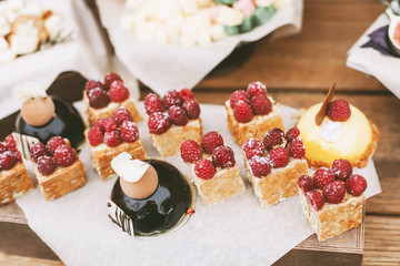 Details of a rustic wedding candy and cheese bar