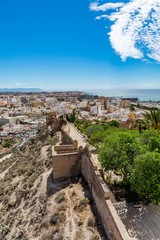 Fototapeta na wymiar Cityscape of Almeria with the walls of Alcazaba (Castle), vertical, Spain 