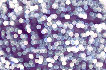 Abstract circle lights on a lilac background
